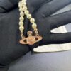 69300ec612f62673a6fac16a West Queen Rose Gold Saturn Pearl Necklace