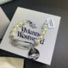 West Queen Brooch Round Plate Pearl Bracelet