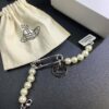 West Queen Brooch Round Plate Pearl Bracelet