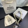 West Queen Brooch Round Plate Pearl Bracelet