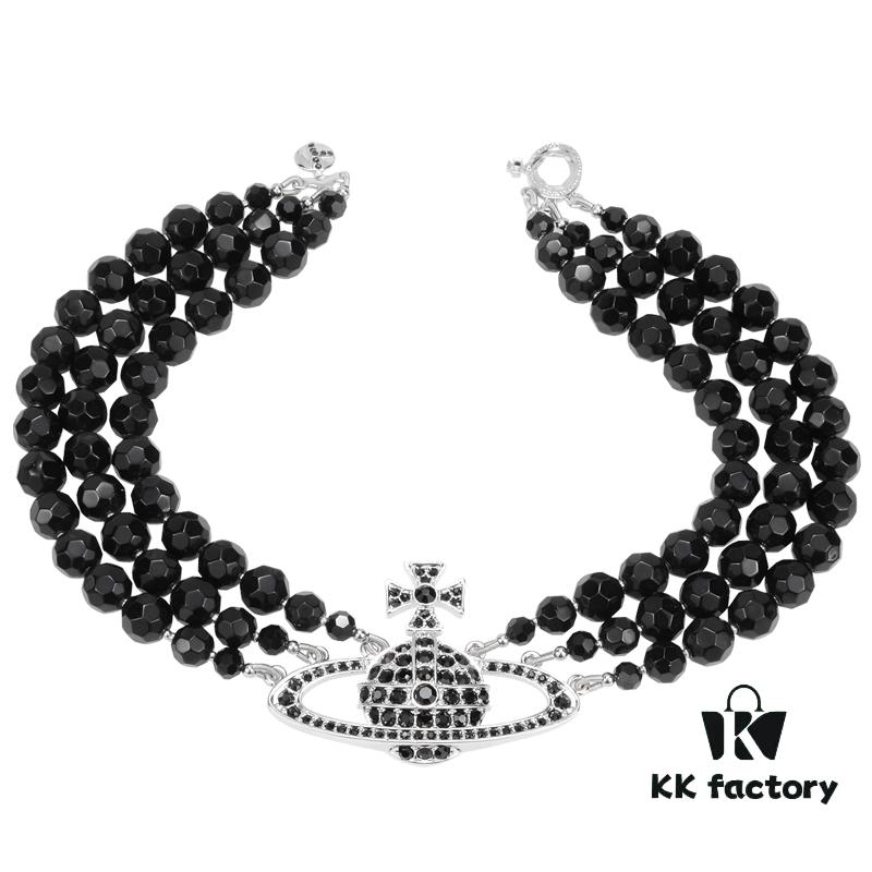 69300ed912f62673a6fac18d Vivienne Westwood Black Crystal Triple Saturn Necklace, Slimming Design