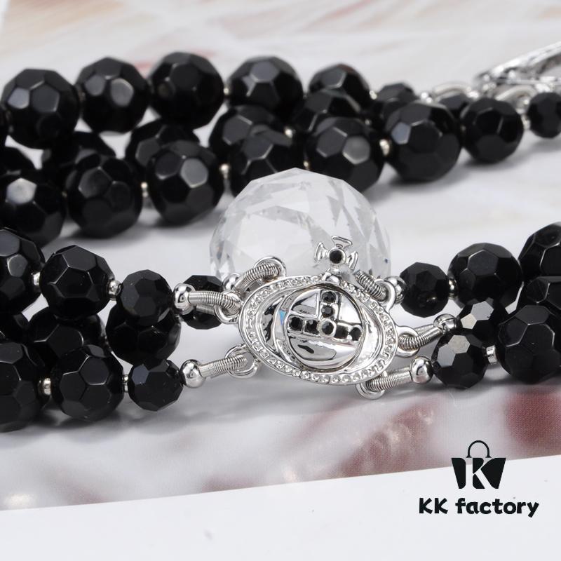 69300eda12f62673a6fac190 Vivienne Westwood Black Crystal Triple Saturn Necklace, Slimming Design
