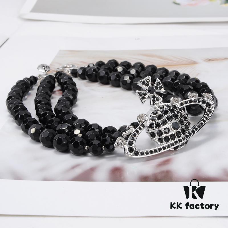 69300edc12f62673a6fac193 Vivienne Westwood Black Crystal Triple Saturn Necklace, Slimming Design