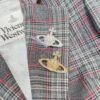 Saturn Brooch Wearing Look