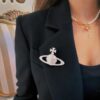 Saturn Brooch Wearing Look