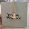 69300f9912f62673a6fac2bb Vivienne Westwood Pink 3D Planet Sparkling Rhinestone Necklace