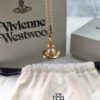West Queen Three-Dimensional Saturn Pearl Necklace in Gold Color