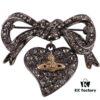 69300fe412f62673a6fac341 Vivienne Westwood Titanium Black Heart Bow Brooch