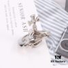 West Queen 3D Saturn Brooch