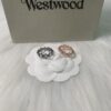 West Queen Saturn Ring Set in Black and White Gold with White Diamonds, Rose Gold with Pink Diamonds