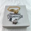 6930105912f62673a6fac3fd Vivienne Westwood Pig Bracelet in Gold and White Gold Color, In Stock