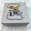 6930105a12f62673a6fac3fe Vivienne Westwood Pig Bracelet in Gold and White Gold Color, In Stock