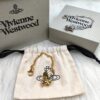 6930105d12f62673a6fac403 Vivienne Westwood Pig Bracelet in Gold and White Gold Color, In Stock