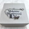 6930105d12f62673a6fac404 Vivienne Westwood Pig Bracelet in Gold and White Gold Color, In Stock