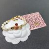6930107212f62673a6fac41f West Queen Enamel Saturn Brooch Orange Necklace and Bracelet, Pearl Necklace and Bracelet Set
