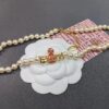 6930107312f62673a6fac421 West Queen Enamel Saturn Brooch Orange Necklace and Bracelet, Pearl Necklace and Bracelet Set