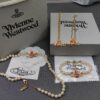 6930107412f62673a6fac423 West Queen Enamel Saturn Brooch Orange Necklace and Bracelet, Pearl Necklace and Bracelet Set