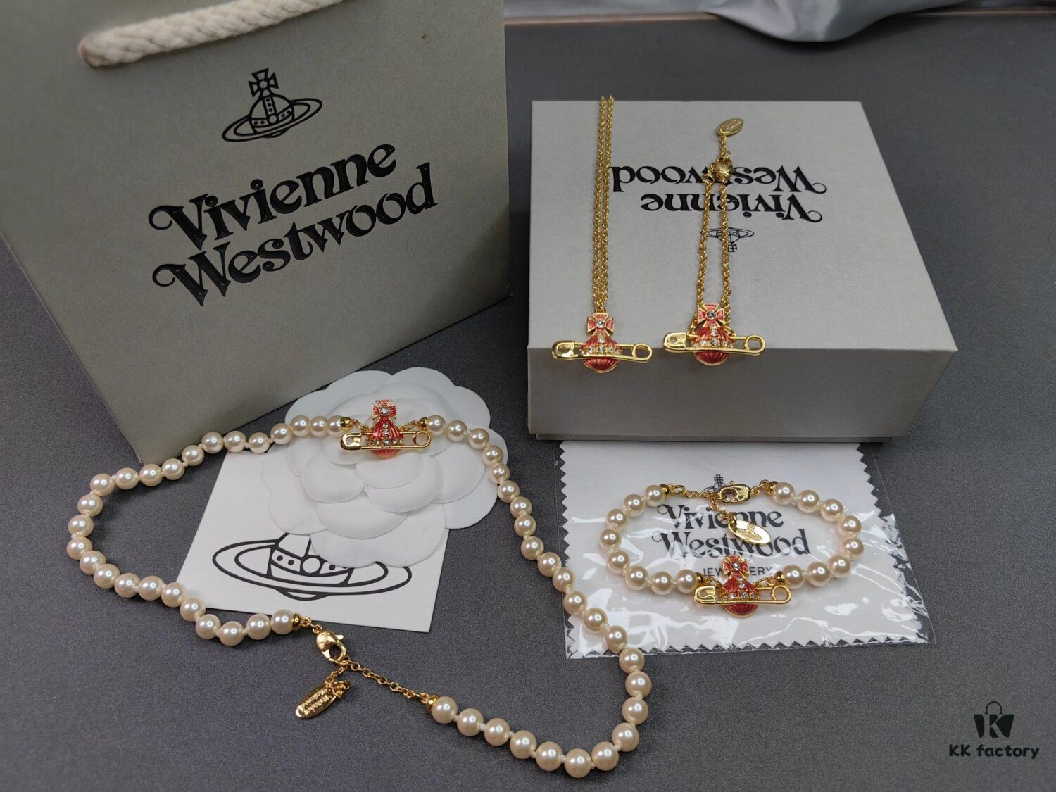 6930107412f62673a6fac423 West Queen Enamel Saturn Brooch Orange Necklace and Bracelet, Pearl Necklace and Bracelet Set