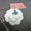 West Queen Single Diamond Blue, Brown, Green Necklace in Gold and White Gold with Blue Diamond
