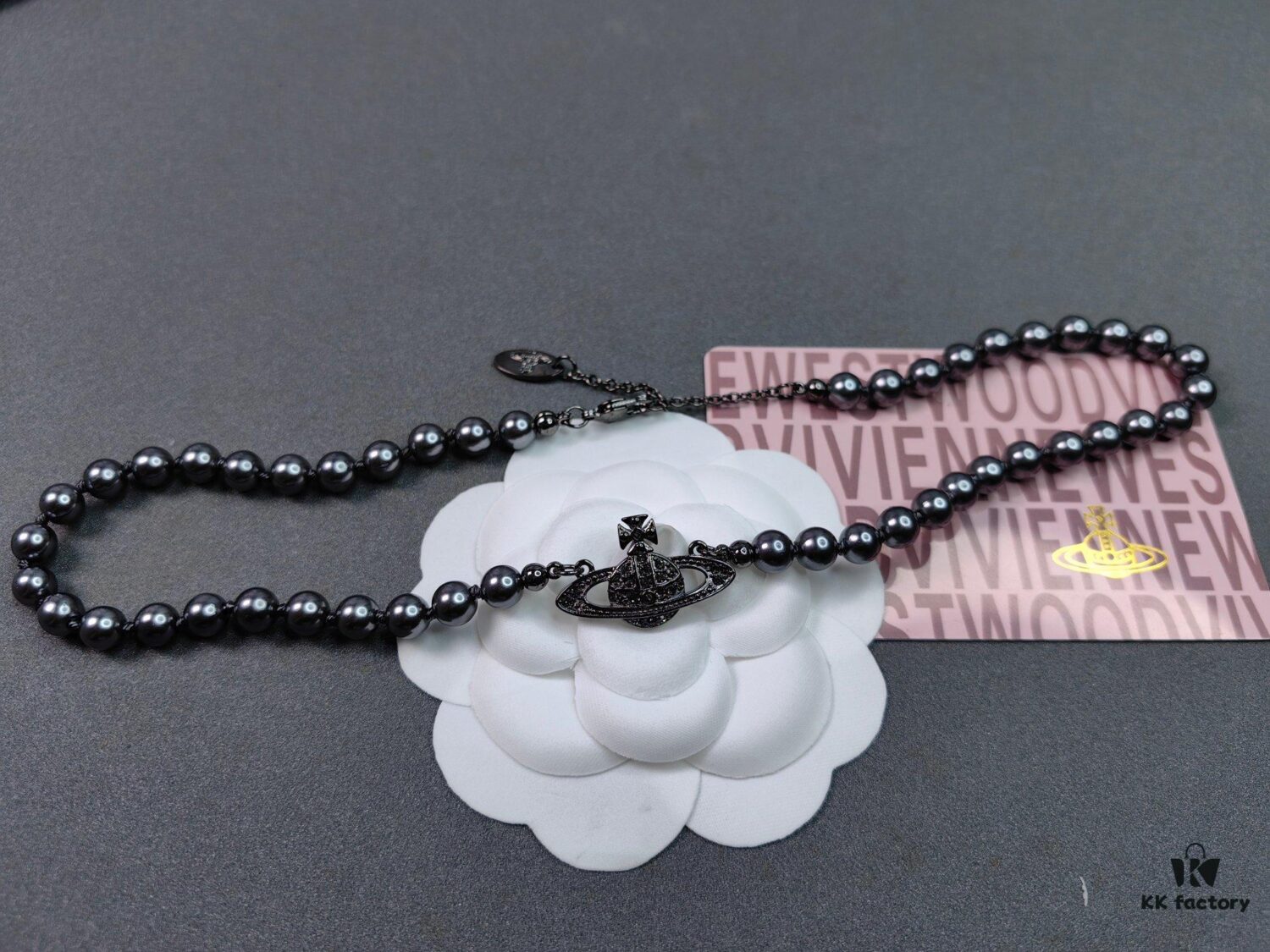 6930107812f62673a6fac428 Vivienne Westwood Black Gun Color Saturn Pearl Necklace