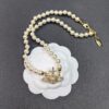West Queen Cross Pearl Necklace with Stripe Design - Gold