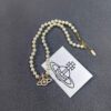 West Queen Cross Pearl Necklace with Stripe Design - Gold