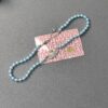 West Queen Light Blue Pearl Saturn Necklace and Bracelet