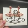 West Queen Saturn Earrings