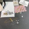693010c312f62673a6fac479 West Queen Half-Pearl Necklace, Bracelet, and Stud Earrings in White Gold and Yellow Gold Two-Tone