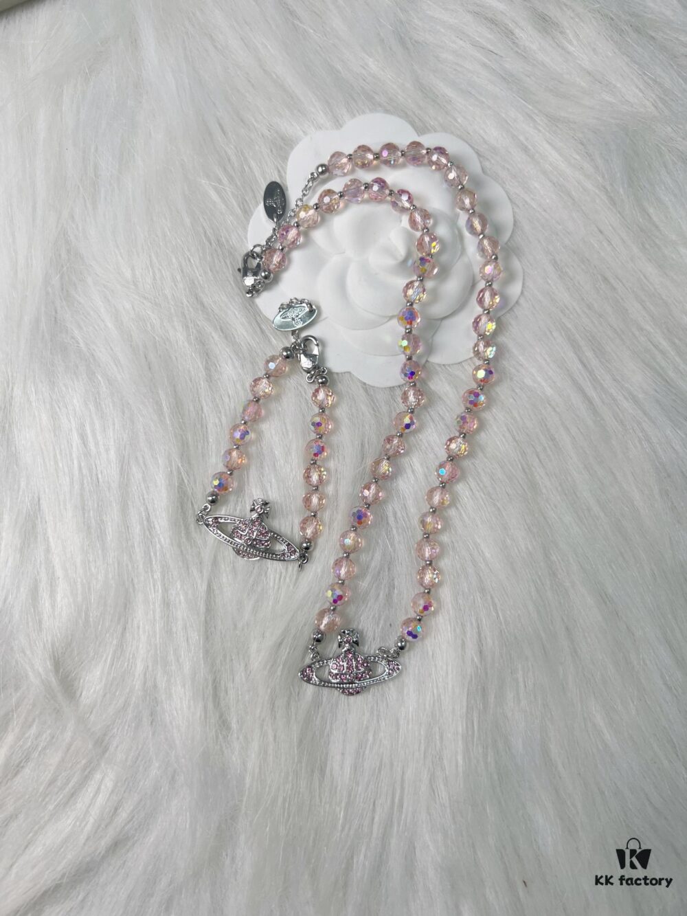 693010d612f62673a6fac495 West Queen Pink Crystal Saturn Necklace Bracelet