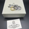 693010d912f62673a6fac498 Vivienne Westwood Saturn Ring with Purple Diamond, Sizes 6, 7, 8