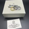 693010dc12f62673a6fac49d Vivienne Westwood Saturn Ring with Purple Diamond, Sizes 6, 7, 8