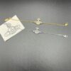 693010df12f62673a6fac4a2 West Queen Snowflake Necklace, Bracelet, and Stud Earrings with Eight-Arrow Eight-Heart Zirconia in White Gold and Yellow Gold