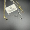 693010e312f62673a6fac4a6 West Queen Skeletal Earrings, Necklace, and Bracelet, Two Colors: White Gold and Yellow Gold C35