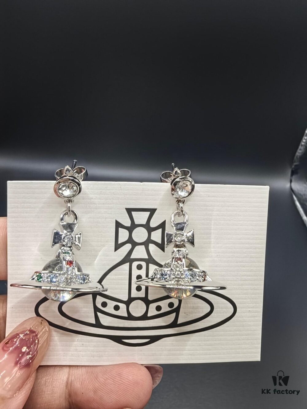 693010ed12f62673a6fac4b5 Vivienne Westwood Transparent Glass Orb Earrings in White Gold, Yellow Gold, and Rose Gold