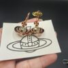 693010ed12f62673a6fac4b7 Vivienne Westwood Transparent Glass Orb Earrings in White Gold, Yellow Gold, and Rose Gold
