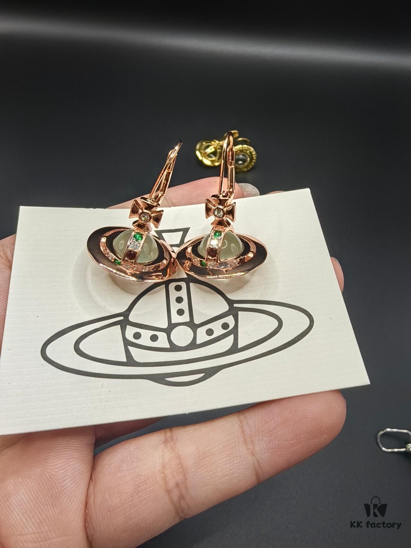 693010ed12f62673a6fac4b7 Vivienne Westwood Transparent Glass Orb Earrings in White Gold, Yellow Gold, and Rose Gold