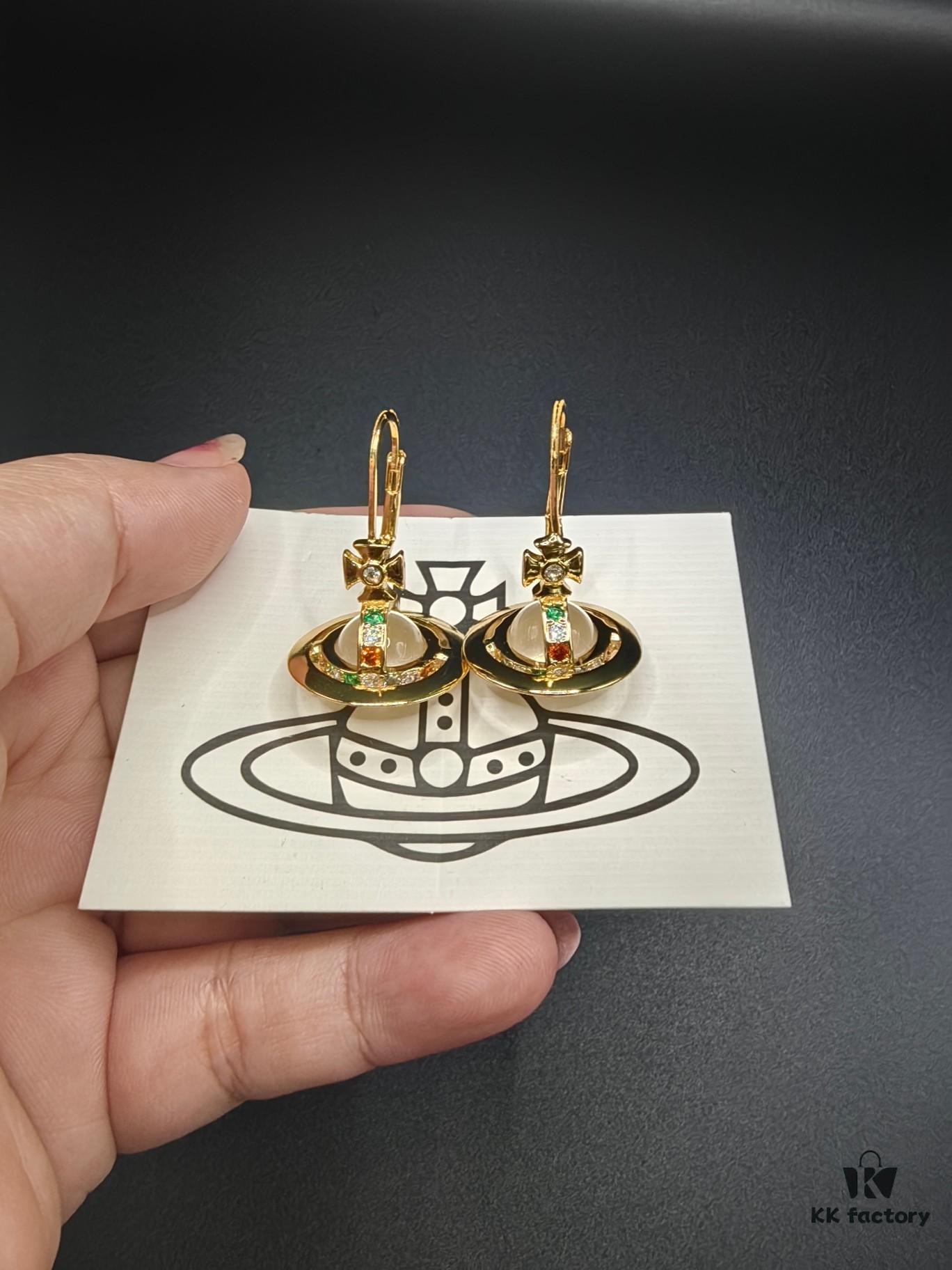 693010ee12f62673a6fac4ba Vivienne Westwood Transparent Glass Orb Earrings in White Gold, Yellow Gold, and Rose Gold