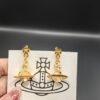 693010ef12f62673a6fac4bb Vivienne Westwood Transparent Glass Orb Earrings in White Gold, Yellow Gold, and Rose Gold