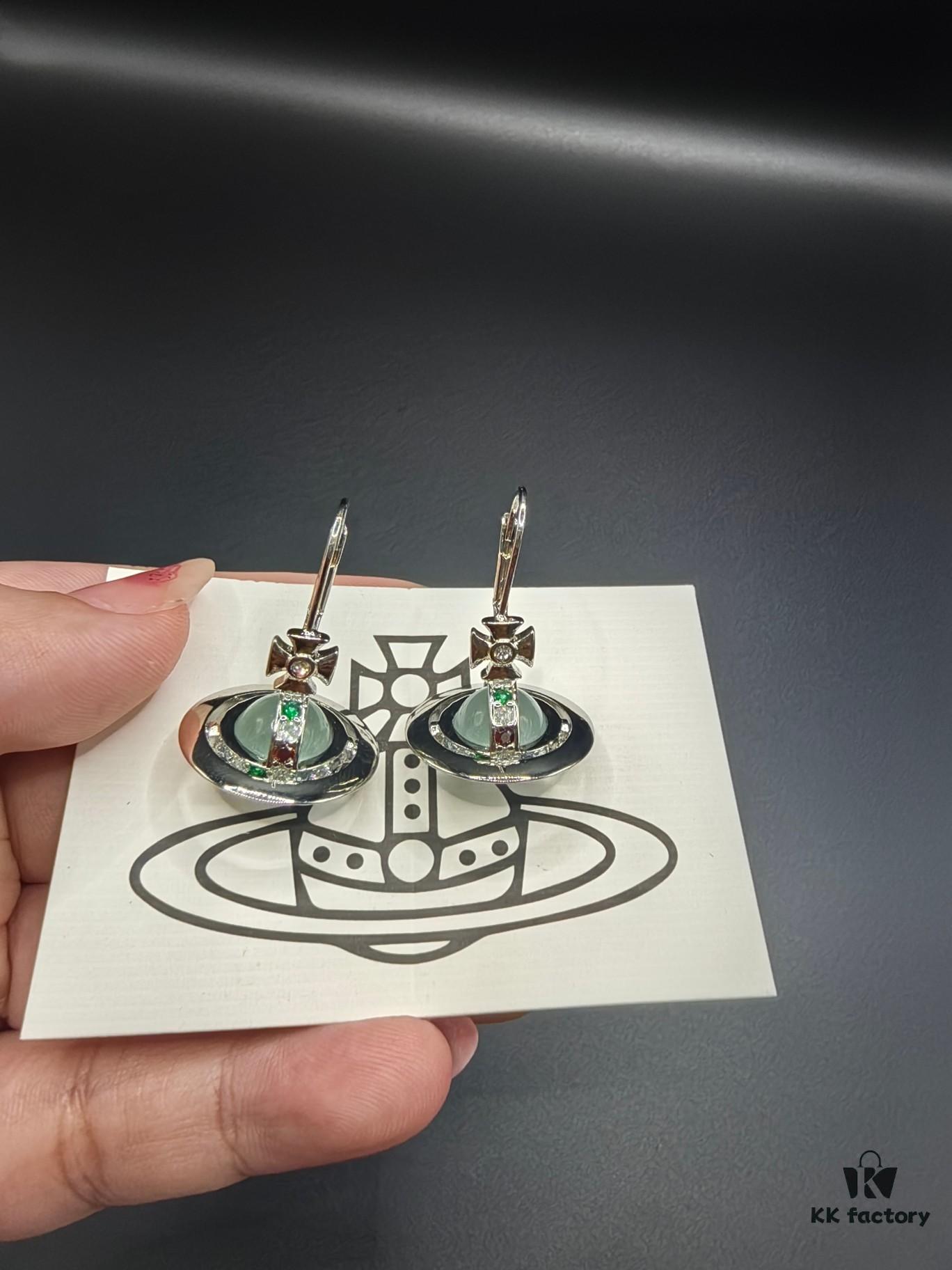 693010f112f62673a6fac4bd Vivienne Westwood Transparent Glass Orb Earrings in White Gold, Yellow Gold, and Rose Gold