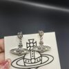 West Dame Saturn Earrings