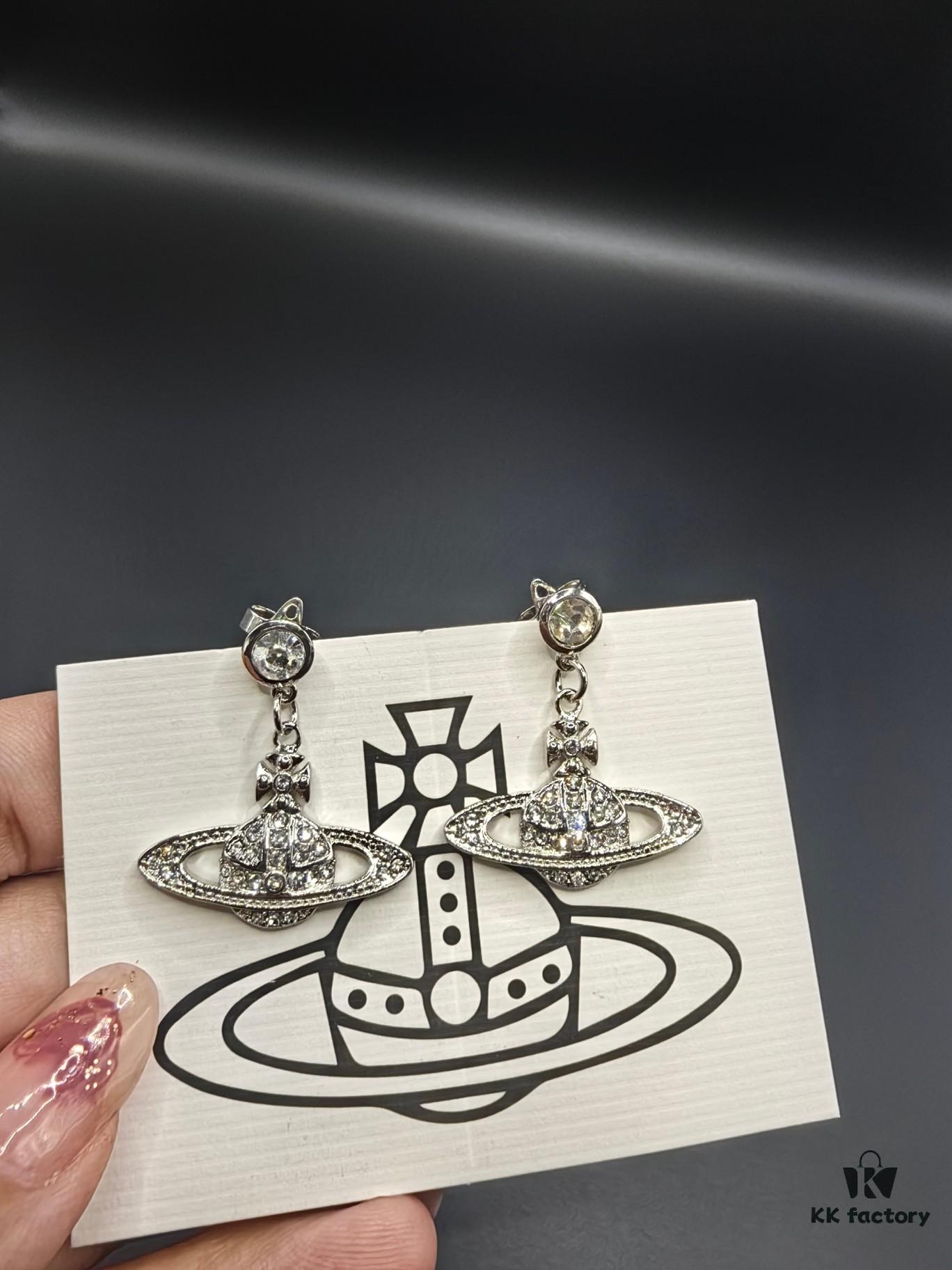West Dame Saturn Earrings