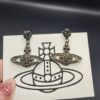 West Dame Saturn Earrings