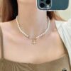 693010fe12f62673a6fac4d4 Vivienne Westwood - Pin Planet Necklace