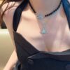 West Grandma Black Pearl Saturn Necklace