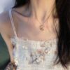 Westminster Saturn Octavie Bow Orb Planet Necklace