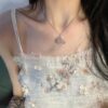 6930113012f62673a6fac515 Vivienne Westwood 3D Earth Planet Crystal Necklace