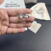 West Queen Half-Round Pearl Mini Saturn Stud Earrings