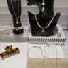 6930118812f62673a6fac583 Saturn | Vivienne Westwood Jewelry - Brooch Style Pearl Necklace and Bracelet