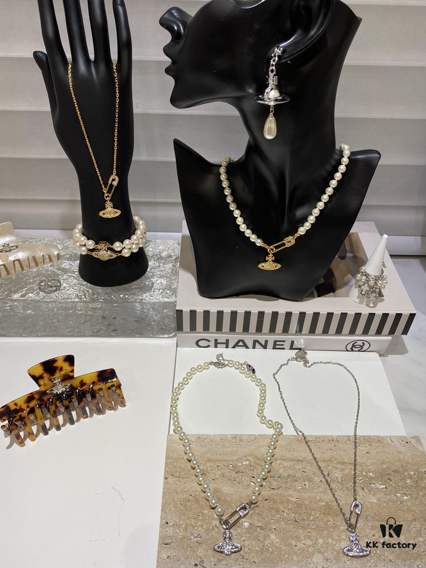 6930118812f62673a6fac583 Saturn | Vivienne Westwood Jewelry - Brooch Style Pearl Necklace and Bracelet